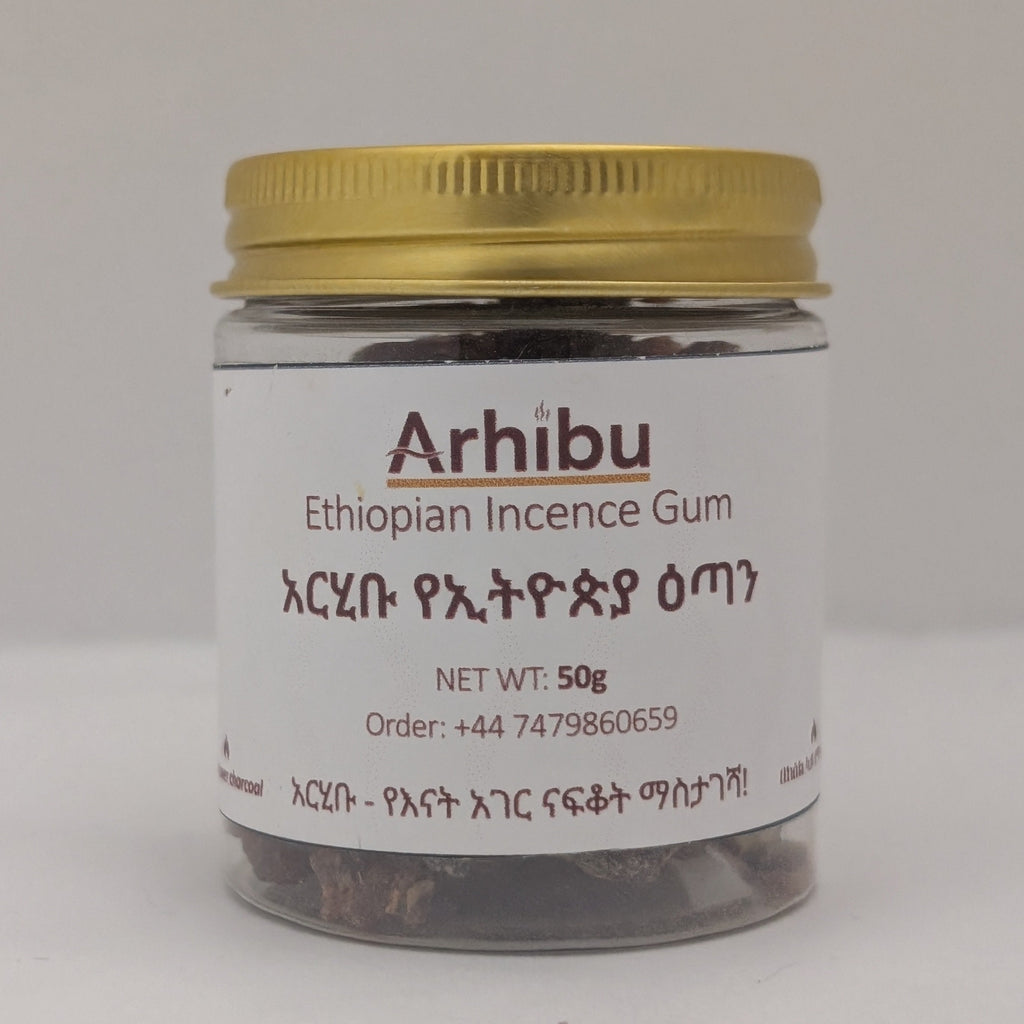 A small clear glass jar of Arhibu Ethiopian Incense Gum with a metallic gold screw cap and a white label, set against a plain light gray background.