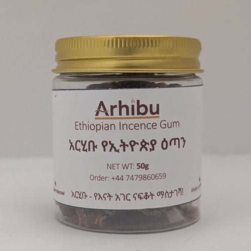 A small clear glass jar of Arhibu Ethiopian Incense Gum with a metallic gold screw cap and a white label, set against a plain light gray background.